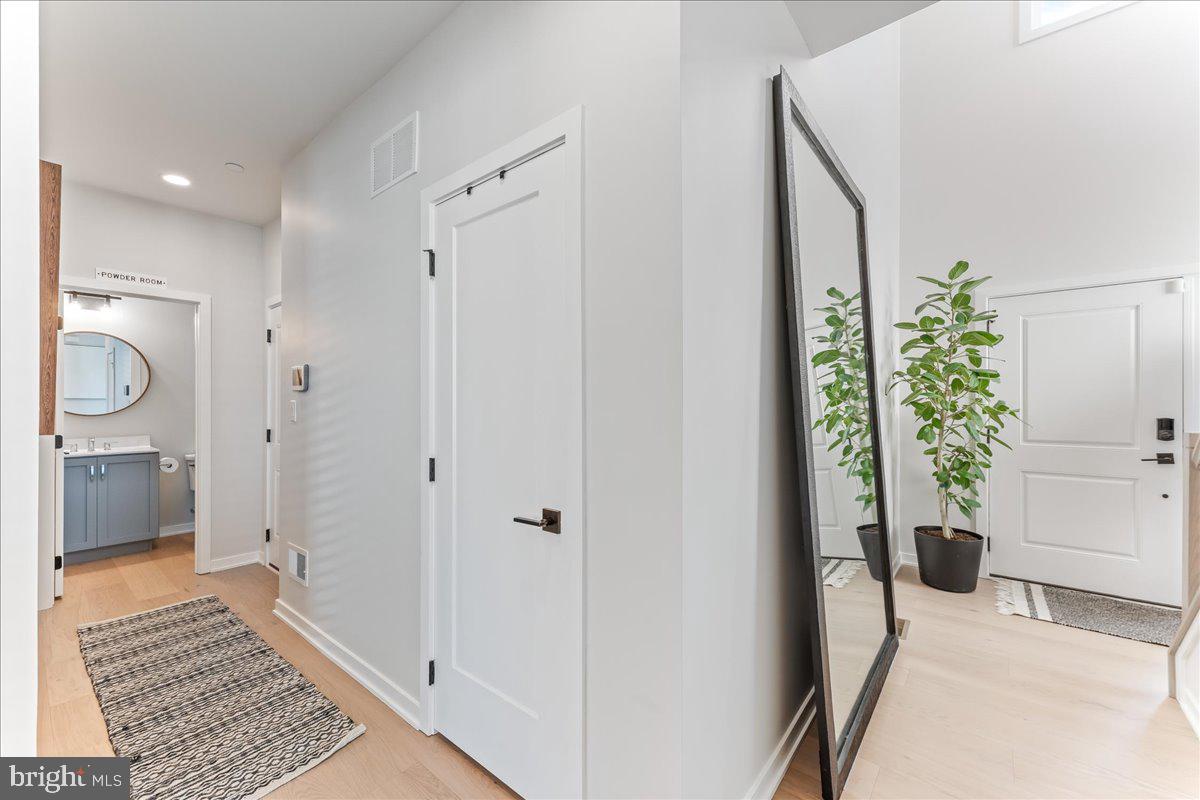 722 Switchman Road Media, PA 19063 - Photo 19 of 46 a view of a hallway and an dining rom with furniture