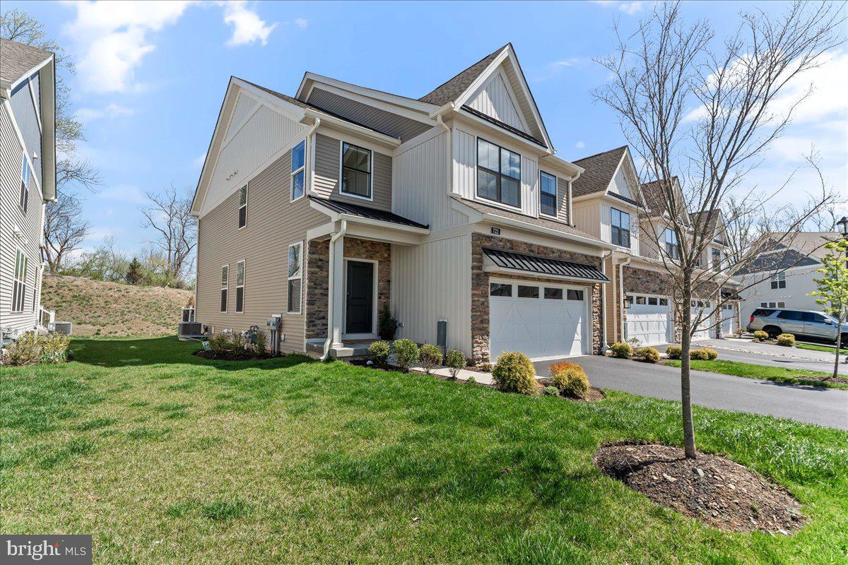 722 Switchman Road Media, PA 19063 - Photo 2 of 46 a front view of a house with a yard