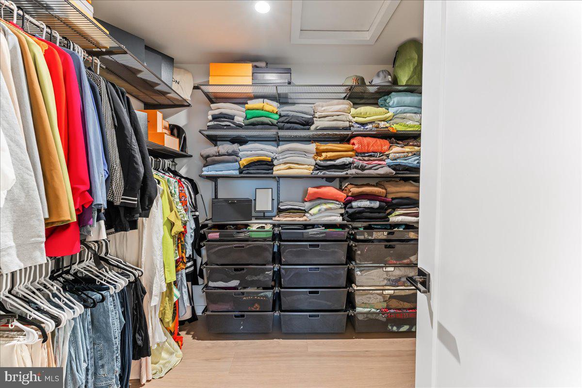 722 Switchman Road Media, PA 19063 - Photo 24 of 46 a view of walk in closet with clothes and shoes
