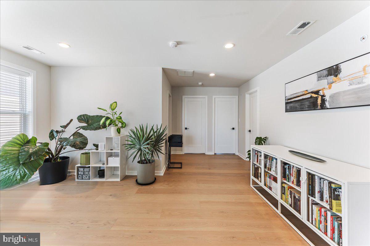 722 Switchman Road Media, PA 19063 - Photo 26 of 46 a view of an empty room with a potted plant