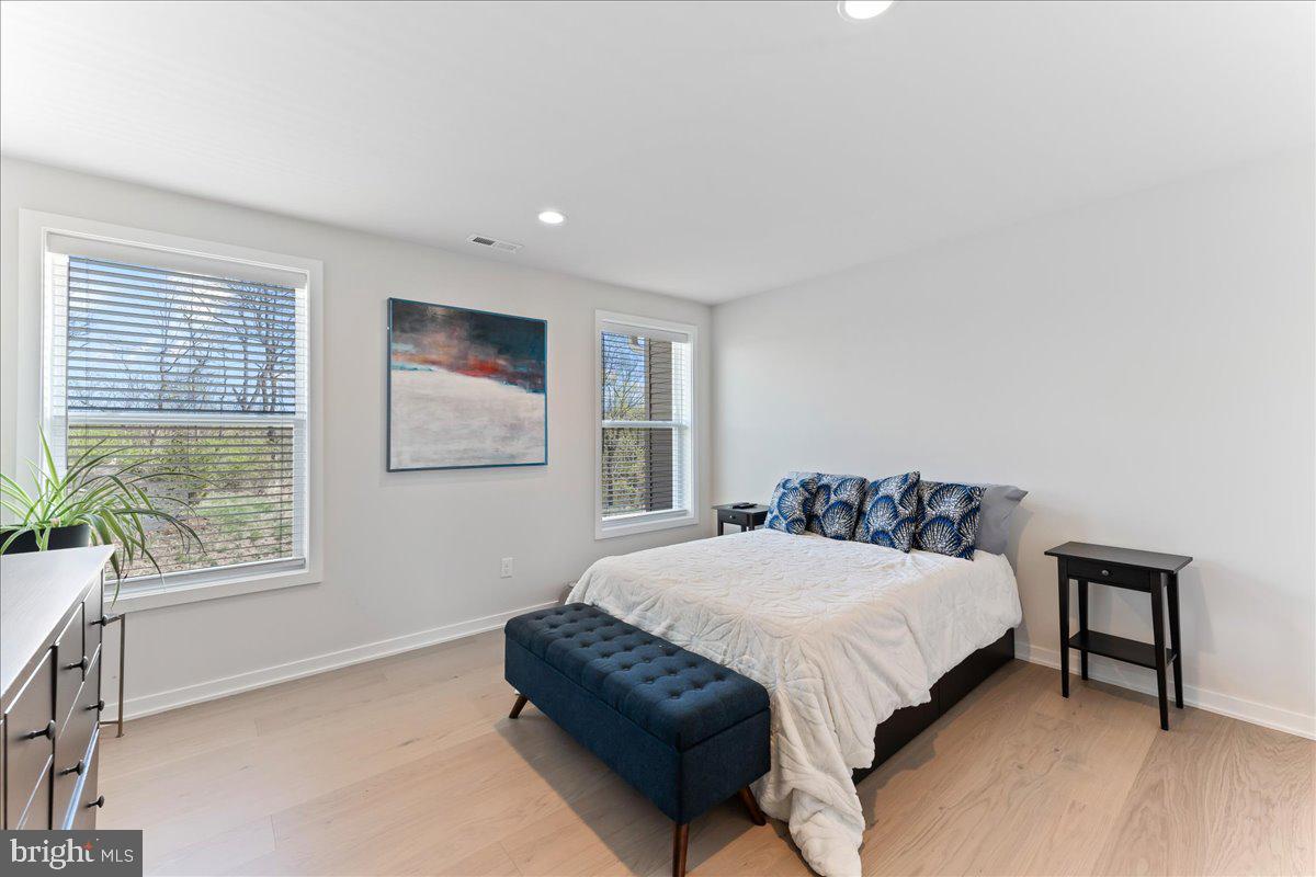 722 Switchman Road Media, PA 19063 - Photo 29 of 46 a bedroom with a bed and a window