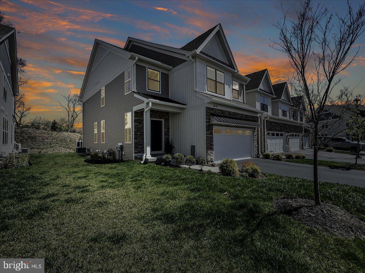 722 Switchman Road Media, PA 19063 - Photo 38 of 46 a front view of a house with a garden