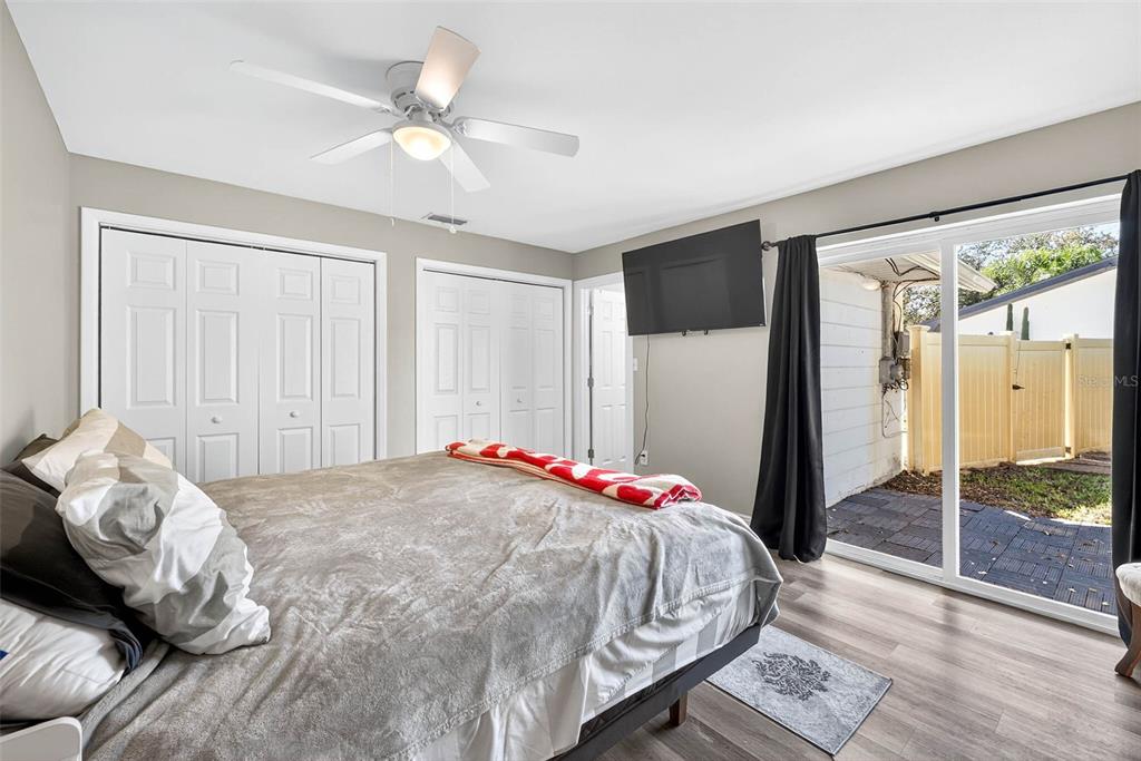 13589 101st Terrace Seminole, FL 33776 - Photo 34 of 43 a bedroom with a bed and a large window