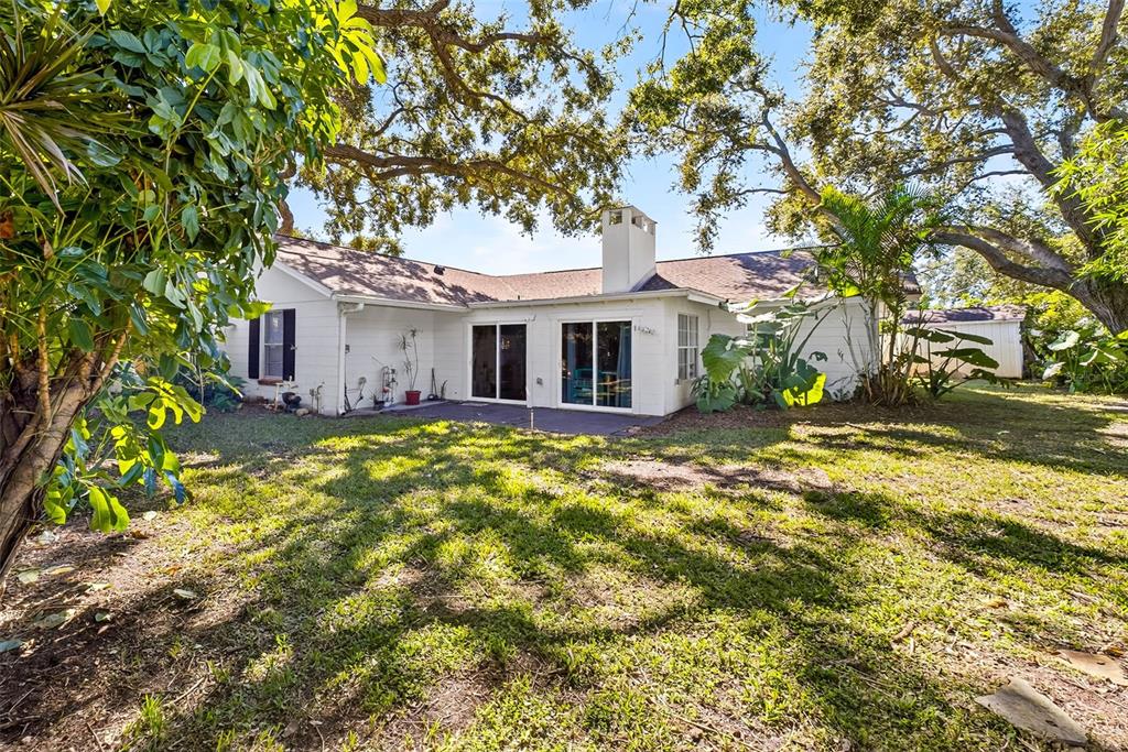 13589 101st Terrace Seminole, FL 33776 - Photo 43 of 43 a view of a house with a tree