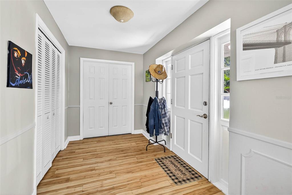 13589 101st Terrace Seminole, FL 33776 - Photo 9 of 43 a view of a livingroom with wooden floor and a window