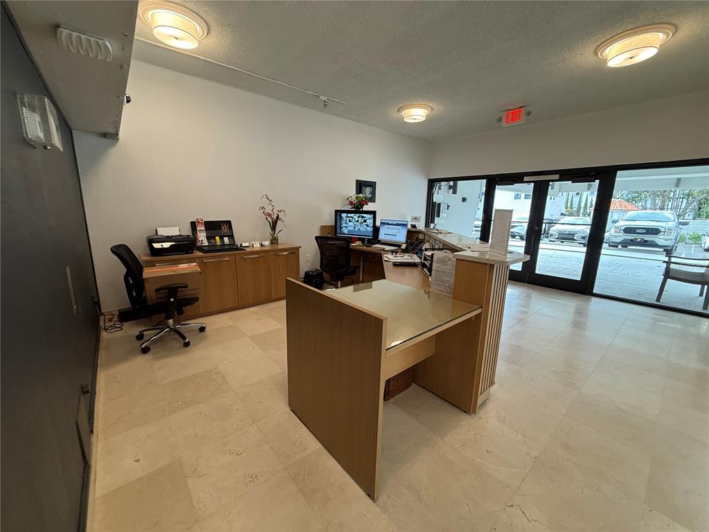 4141 Bayshore Boulevard, Unit 1203 Tampa, FL 33611 - Photo 15 of 16 a view of a workspace with furniture and a window