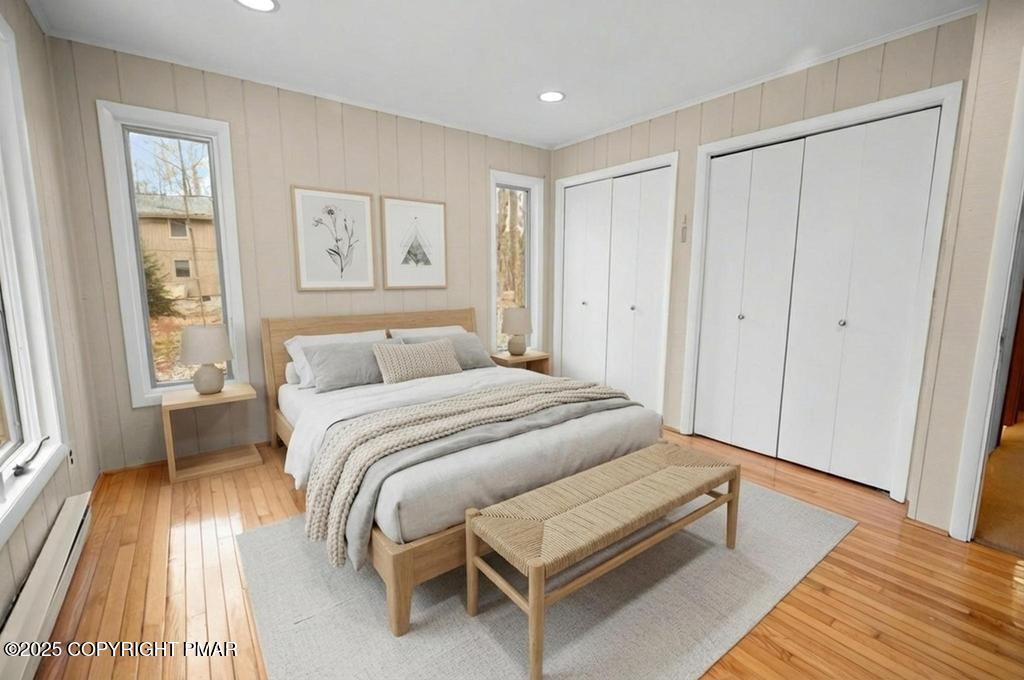 117 Outpost Way Pocono Pines, PA 18350 - Photo 18 of 36 a bedroom with a bed and a rug