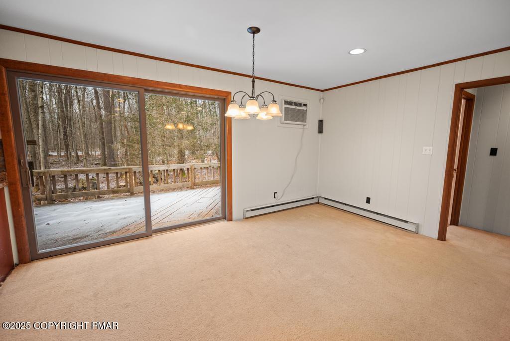 117 Outpost Way Pocono Pines, PA 18350 - Photo 5 of 36 a view of a room with window and chandelier