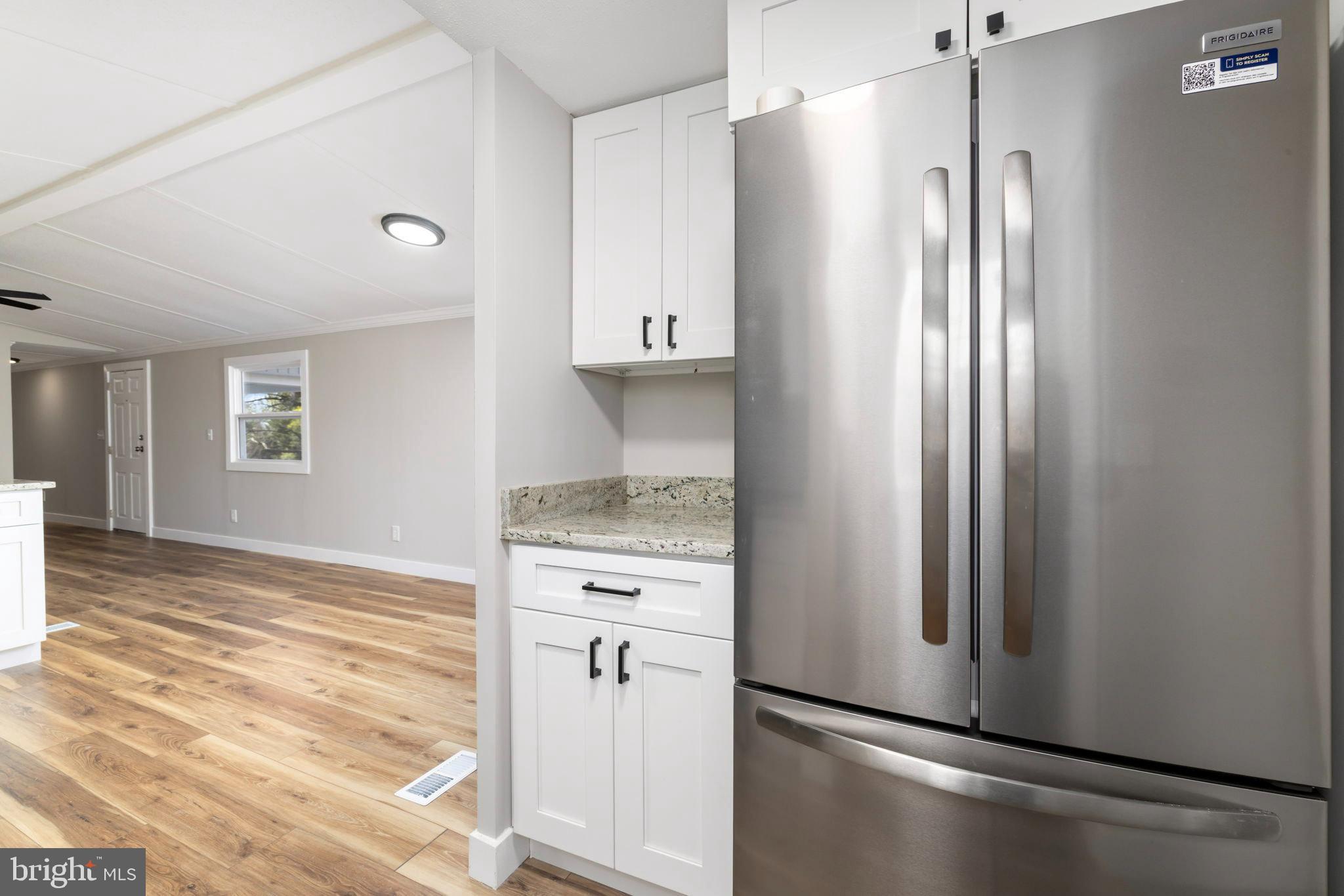 870 South Hill Road Brodnax, VA 23920 - Photo 20 of 39 a view of a kitchen with a refrigerator and cabinets