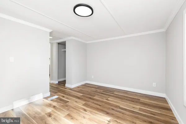 a view of a bathroom with a tub and shower