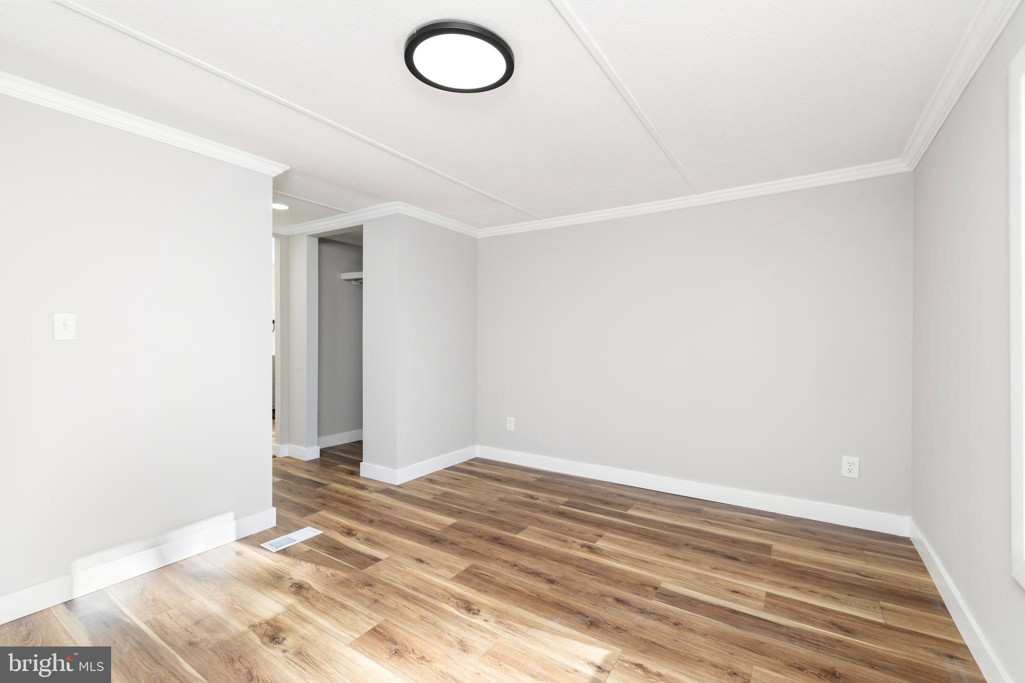 870 South Hill Road Brodnax, VA 23920 - Photo 23 of 39 a view of a room with wooden floor