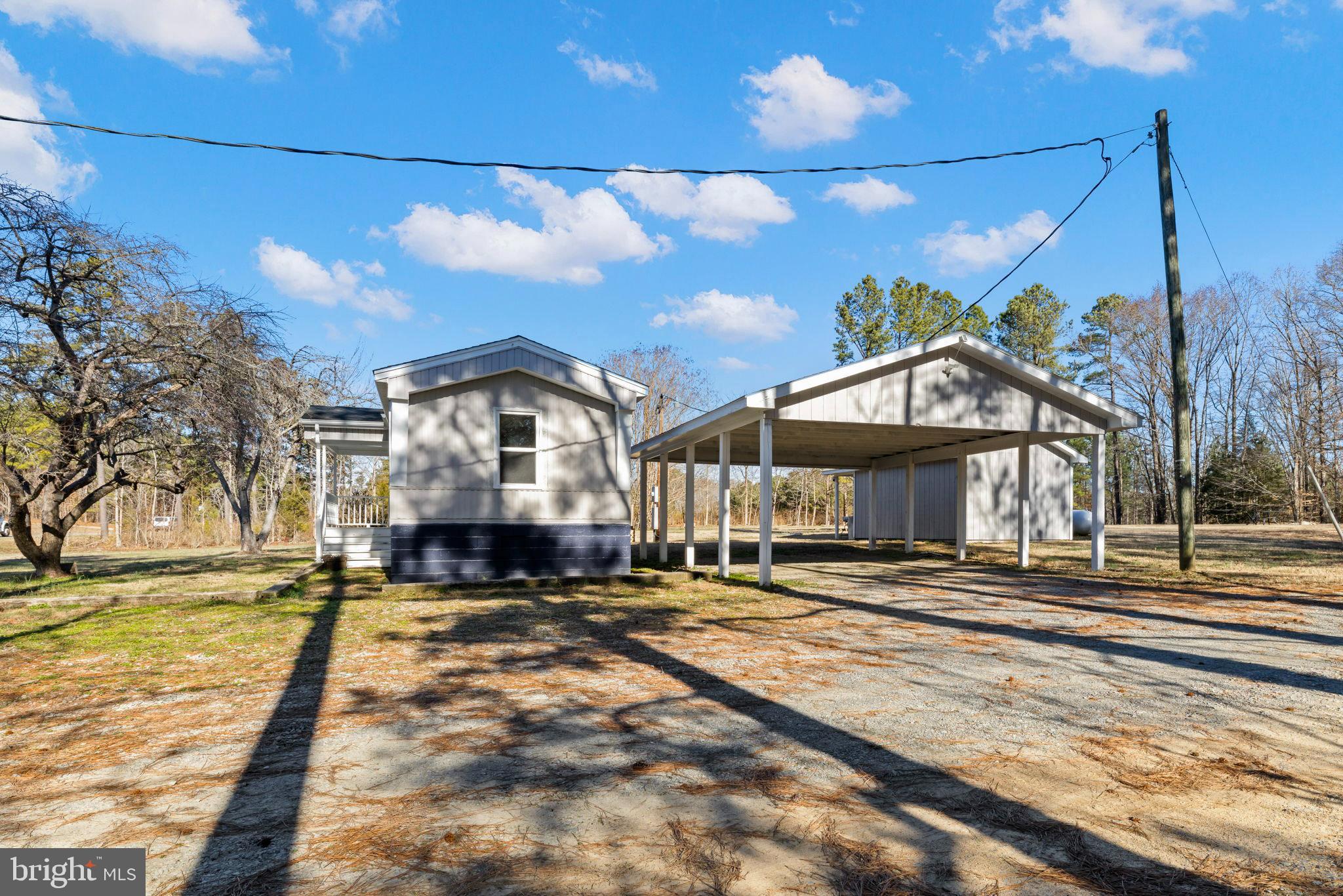 870 South Hill Road Brodnax, VA 23920 - Photo 9 of 39 a front view of a house with a yard