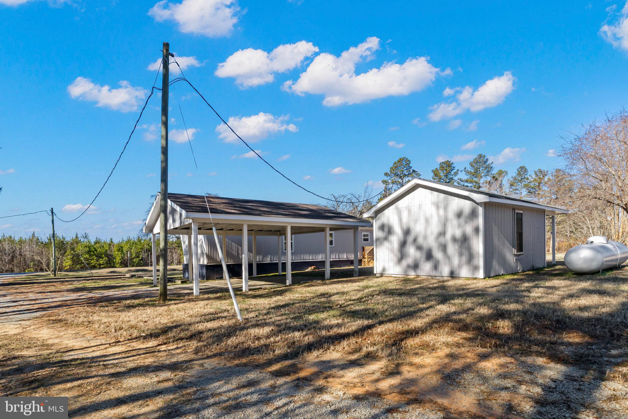 870 South Hill Road Brodnax, VA 23920 - Photo 10 of 39 a view of a house with a yard