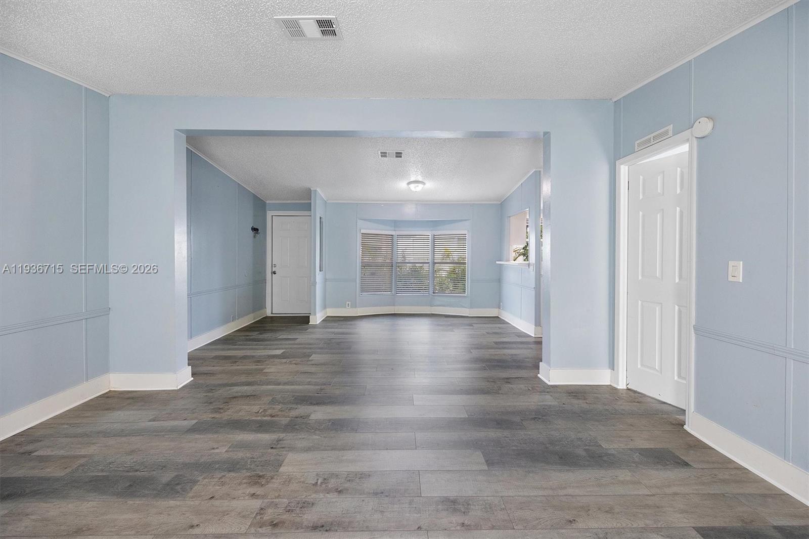 19800 Southwest 180th Avenue Miami, FL 33187 - Photo 11 of 36 a view of livingroom with wooden floor
