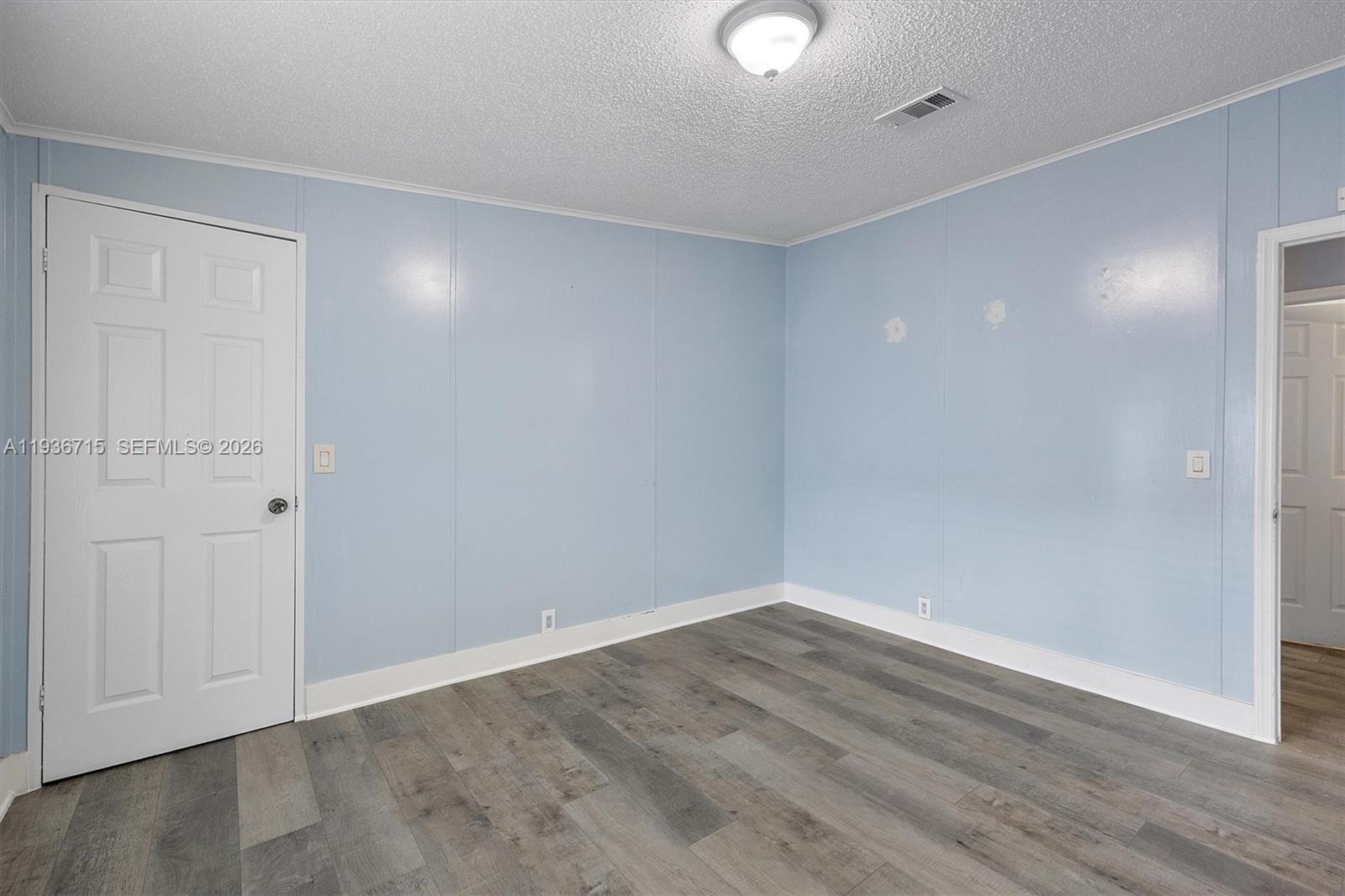 19800 Southwest 180th Avenue Miami, FL 33187 - Photo 24 of 36 wooden floor in an empty room