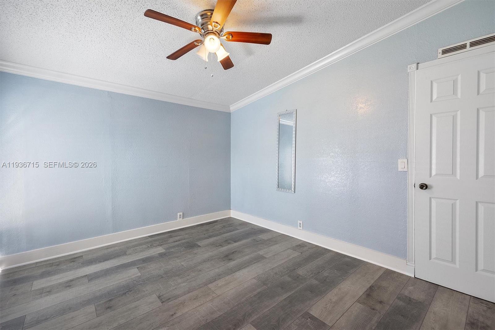 19800 Southwest 180th Avenue Miami, FL 33187 - Photo 29 of 36 wooden floor in an empty room