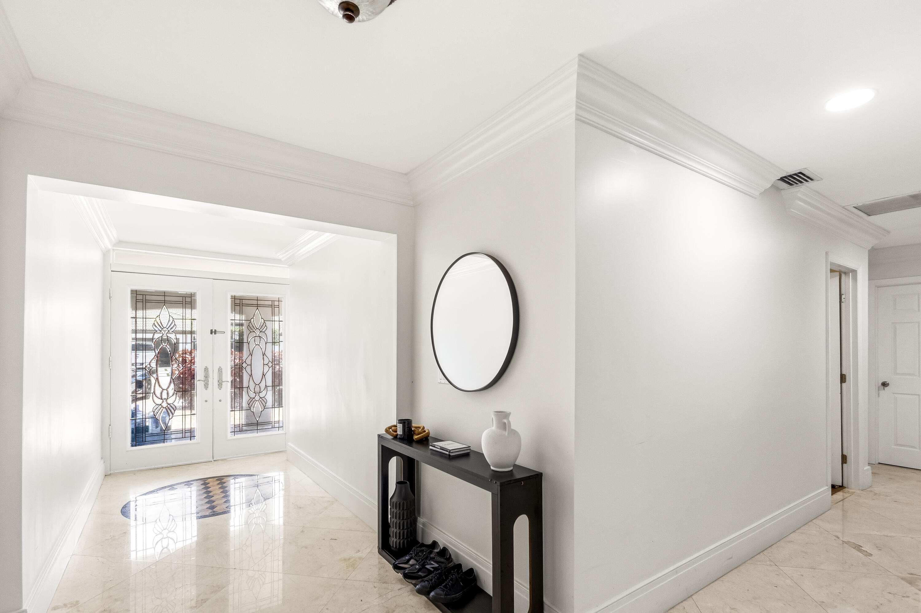 5223 Deerhurst Crescent Circle Boca Raton, FL 33486 - Photo 13 of 51 a bathroom with a sink mirror and a window