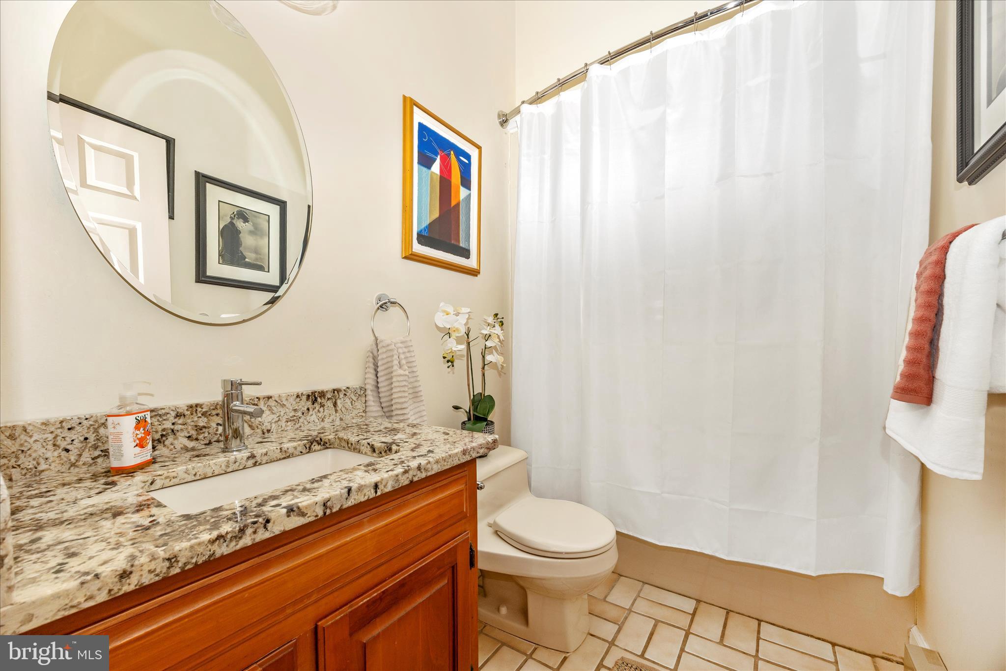 328 Lindbergh Avenue Frederick, MD 21701 - Photo 21 of 53 Hall Bath features a tub shower & skylight.