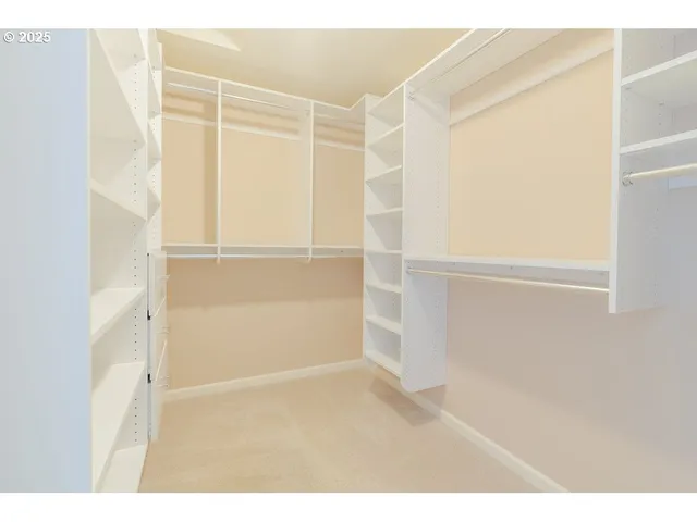 a view of an empty walk in closet