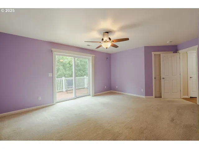 a view of empty room with fan