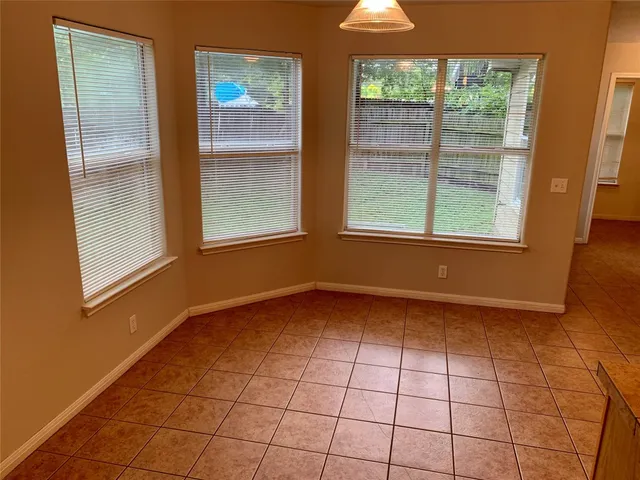 a view of livingroom with hardwood floor and window