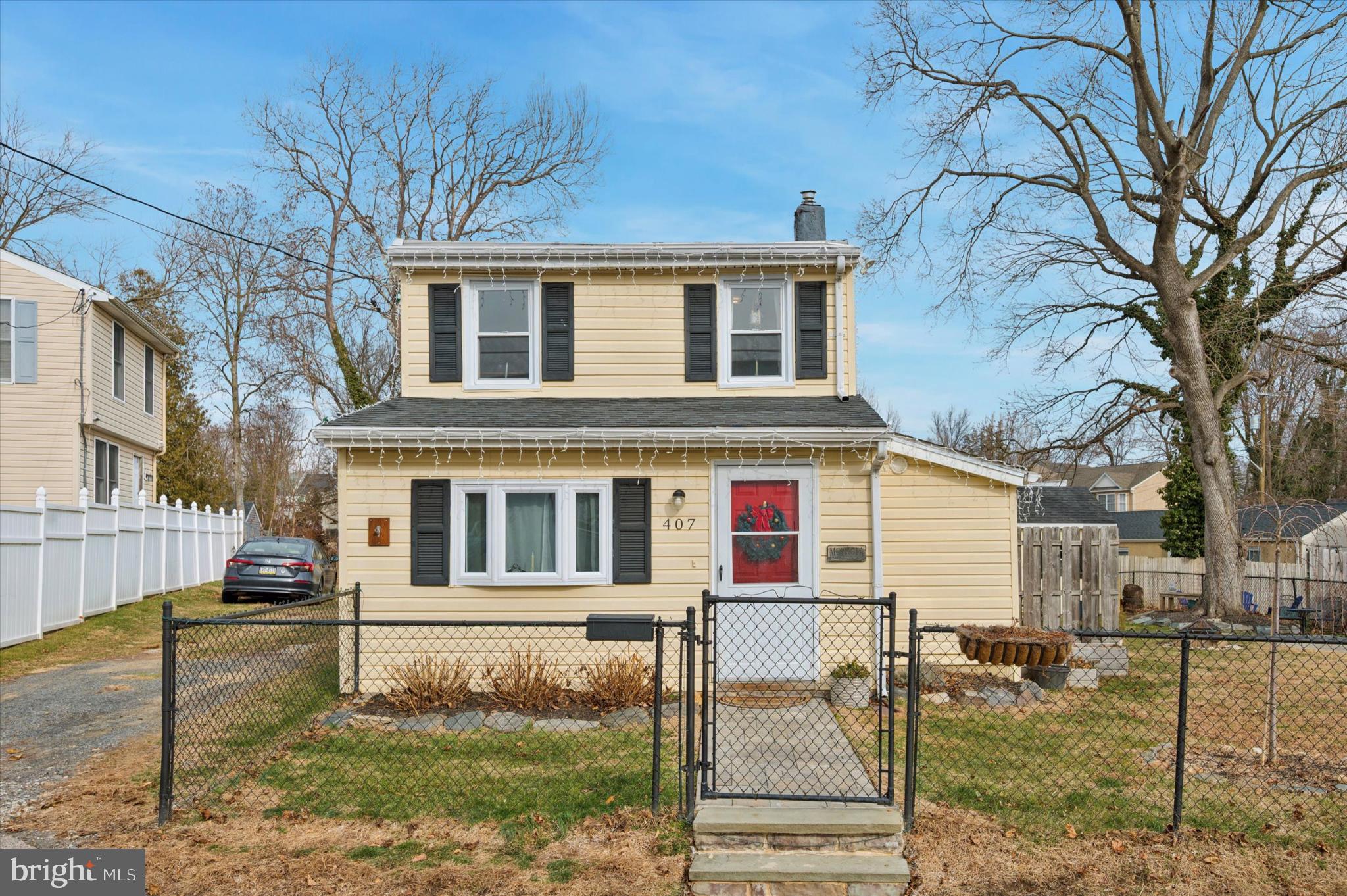 407 Emerald Street Media, PA 19063 - Photo 1 of 15 Charming yellow home with inviting entrance.