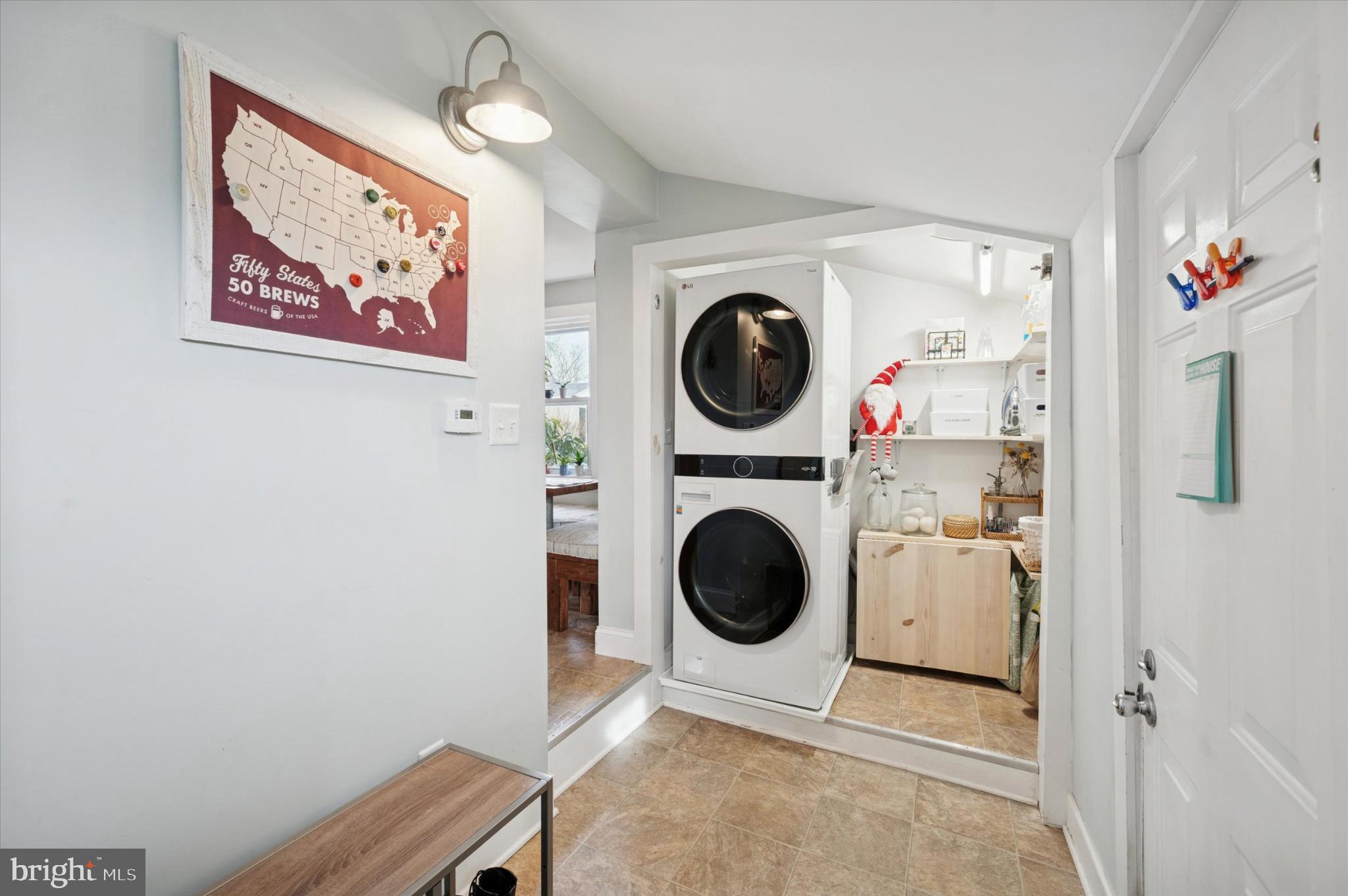 407 Emerald Street Media, PA 19063 - Photo 11 of 15 Charming laundry nook with modern appliances.