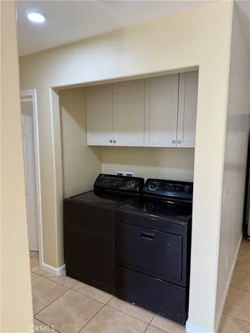 a stove top oven sitting inside of a kitchen