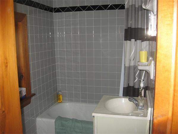 336 Mashapaug Road Holland, MA 01521 - Photo 16 of 17 a bathroom with a tub
