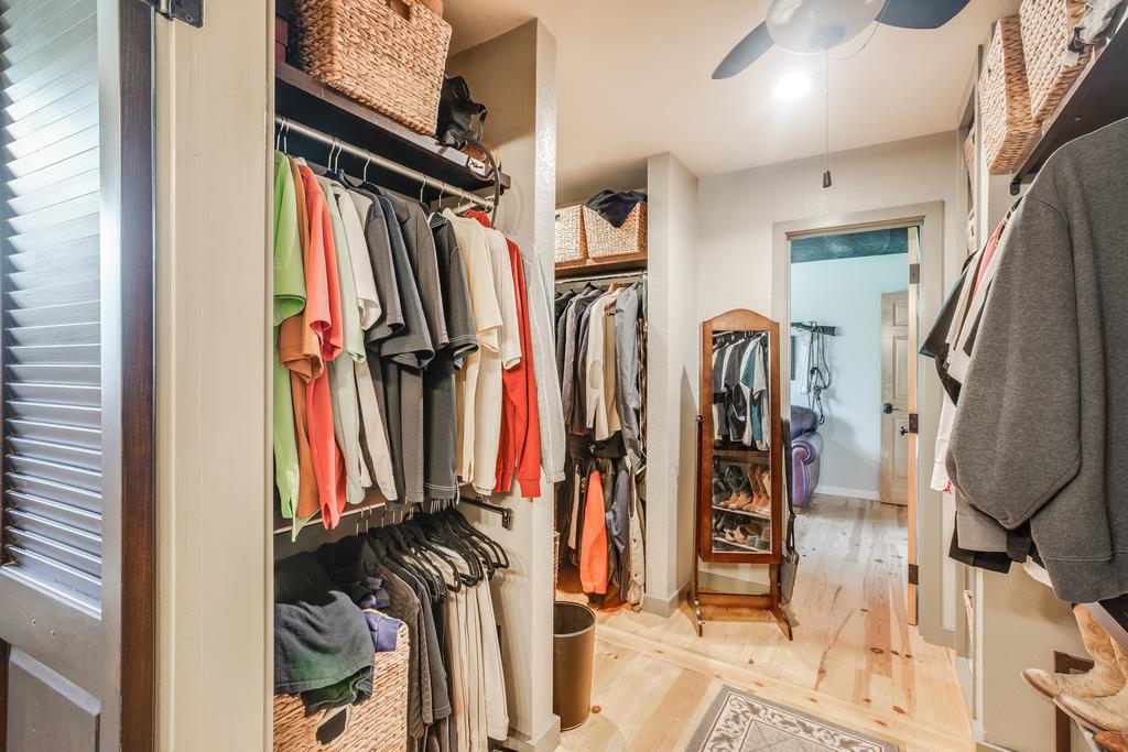 10640 La Corte Lane Gilroy, CA 95020 - Photo 15 of 29 a view of walk in closet with clothes