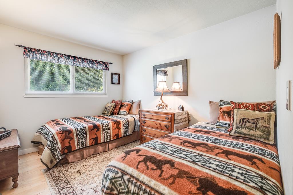 10640 La Corte Lane Gilroy, CA 95020 - Photo 17 of 29 a bedroom with two beds and a window