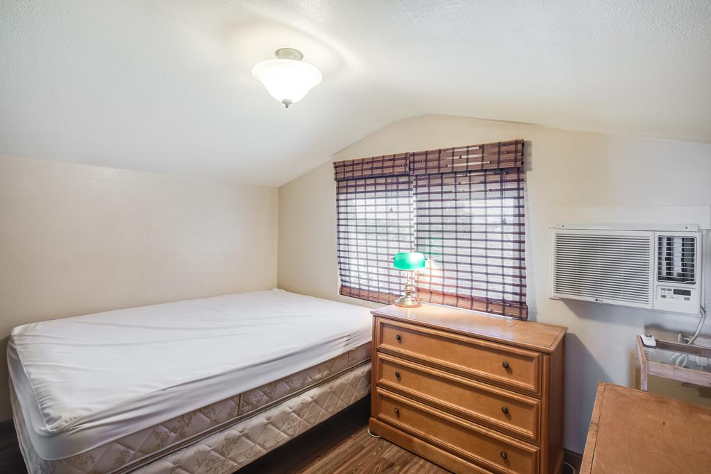 10640 La Corte Lane Gilroy, CA 95020 - Photo 26 of 29 a bedroom with a bed and a window