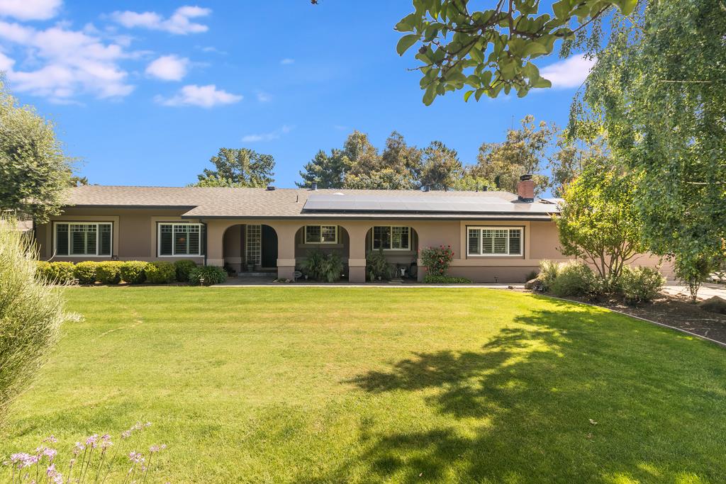 10640 La Corte Lane Gilroy, CA 95020 - Photo 3 of 29 a front view of a house with a garden