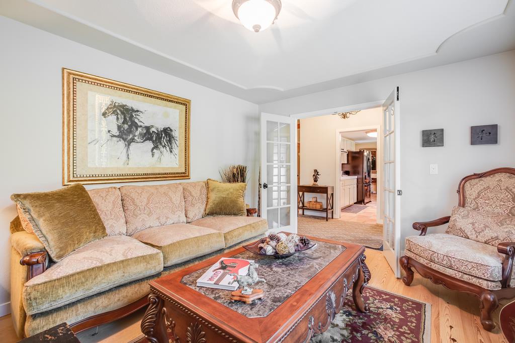 10640 La Corte Lane Gilroy, CA 95020 - Photo 5 of 29 a living room with furniture and a chandelier