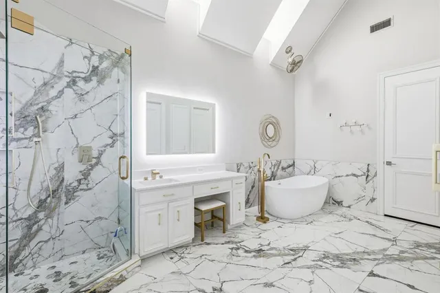 a living room with a fireplace and a fireplace