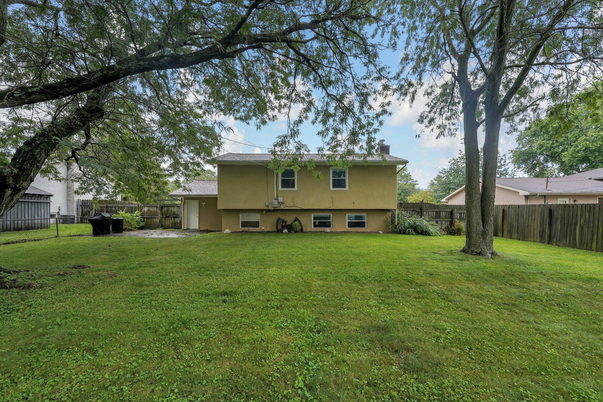 563 McCutcheon Road Columbus, OH 43230 - Photo 27 of 27 Stucco and brick exterior, fabulous yard!