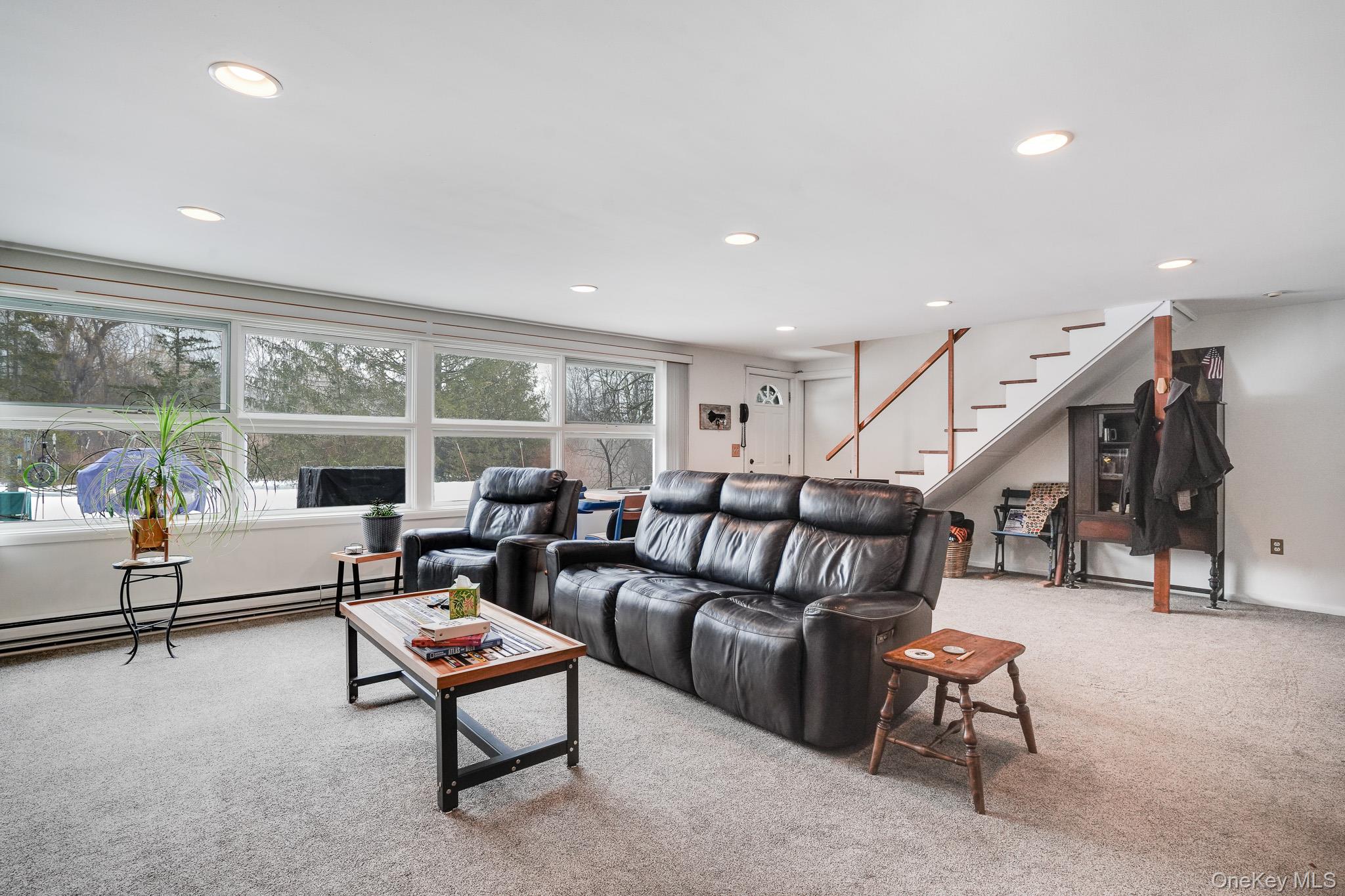 33 Milltown Road Brewster, NY 10509 - Photo 22 of 30 a living room with furniture and a large window