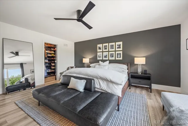 a bed room with a bed and a window