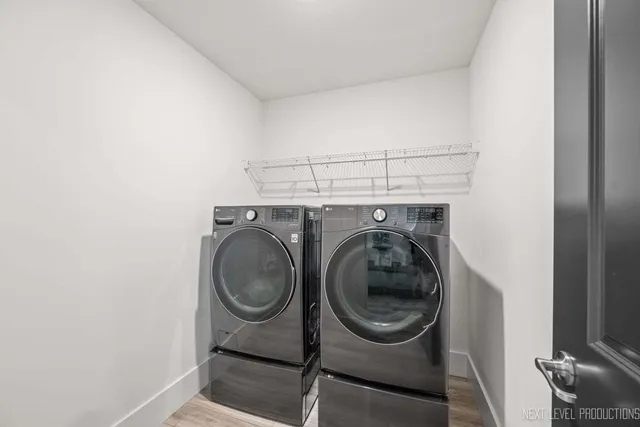 a utility room with dryer and washer