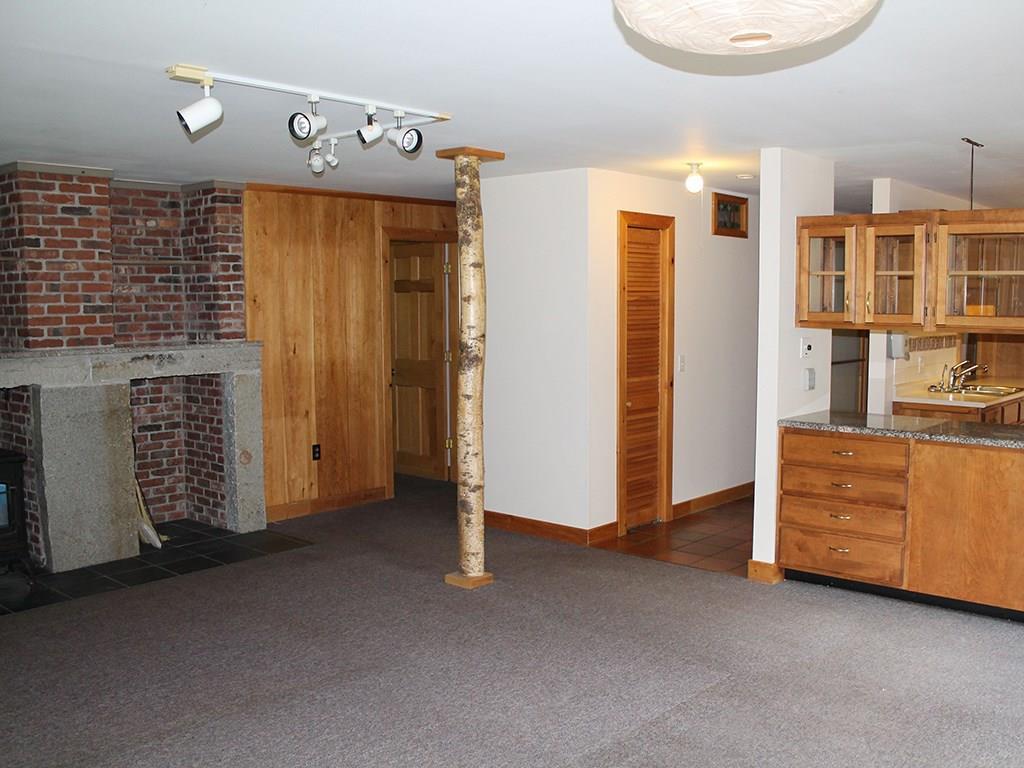 909 Oak Point Road Trenton, ME 04605 - Photo 8 of 30 Living room with attractive birch...