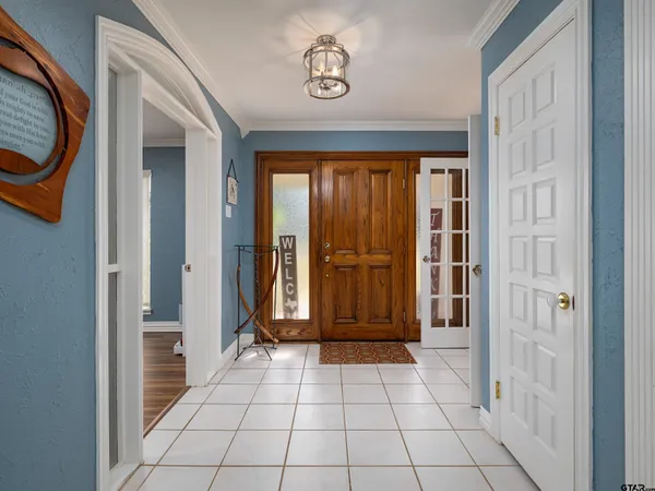 a view of an entryway with a door