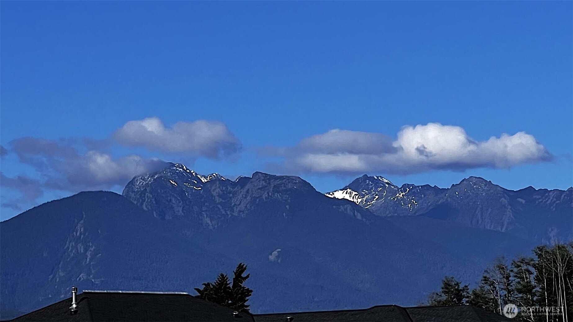 9999 Macleay Road Sequim, WA 98382 - Photo 11 of 16 a sunset view with a lake