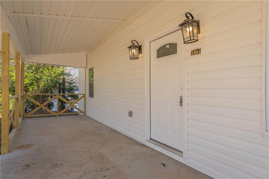 3107 Hendrix Circle Southwest Covington, GA 30014 - Photo 14 of 66 a view of a room with rack and windows