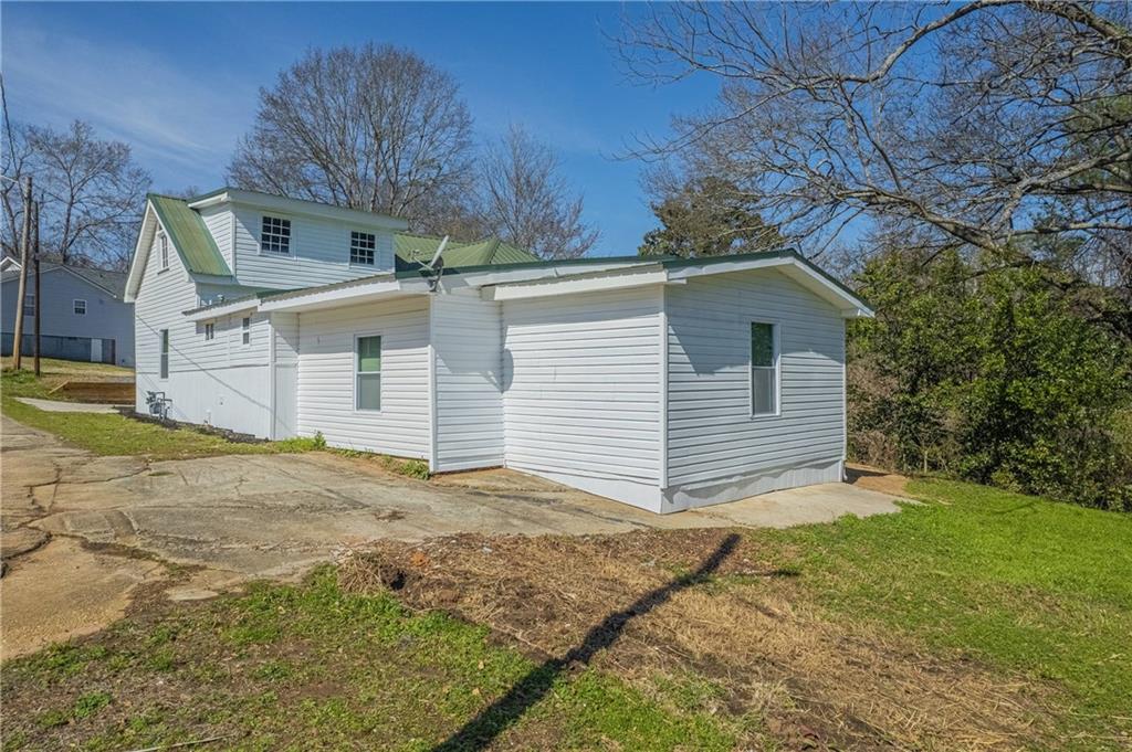 3107 Hendrix Circle Southwest Covington, GA 30014 - Photo 2 of 66 a front view of a house with garden