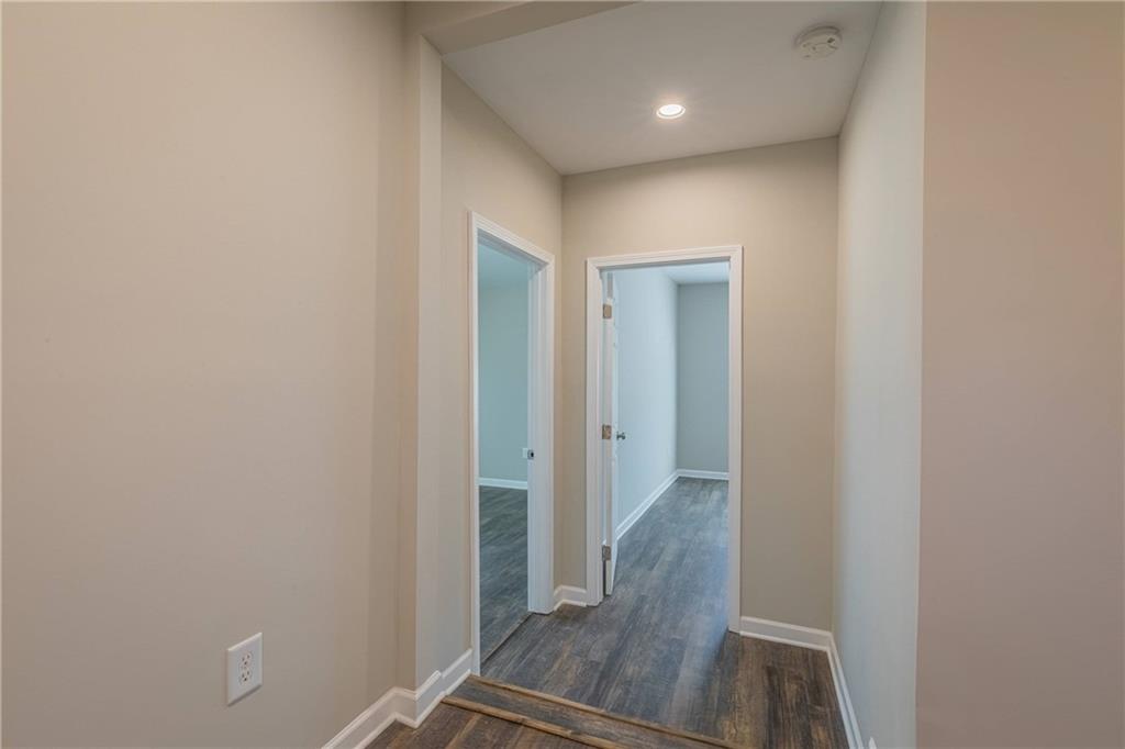 3107 Hendrix Circle Southwest Covington, GA 30014 - Photo 47 of 66 a view of a hallway with wooden floor