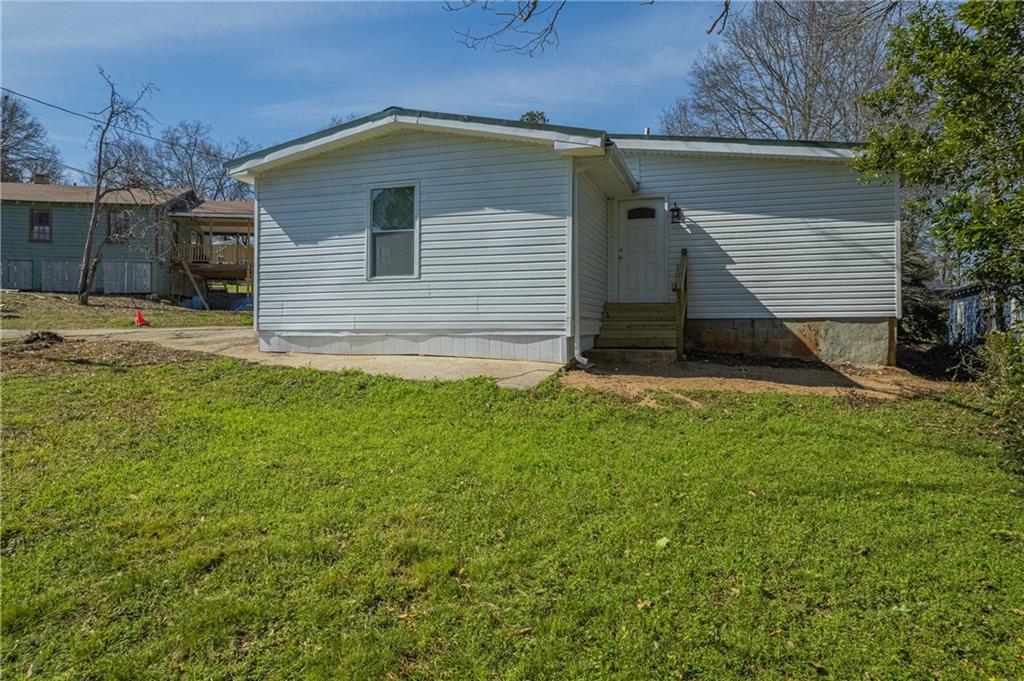 3107 Hendrix Circle Southwest Covington, GA 30014 - Photo 63 of 66 a front view of house with yard