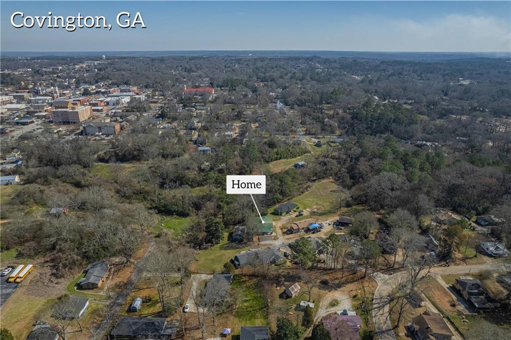 3107 Hendrix Circle Southwest Covington, GA 30014 - Photo 65 of 66 an aerial view of house with yard and mountain view in back