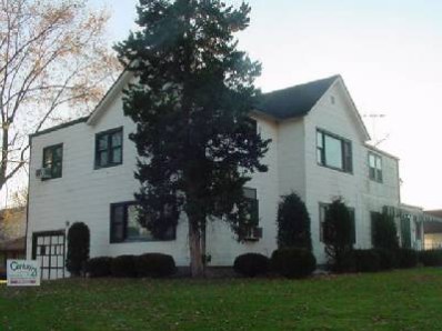 a view of a house with a garden