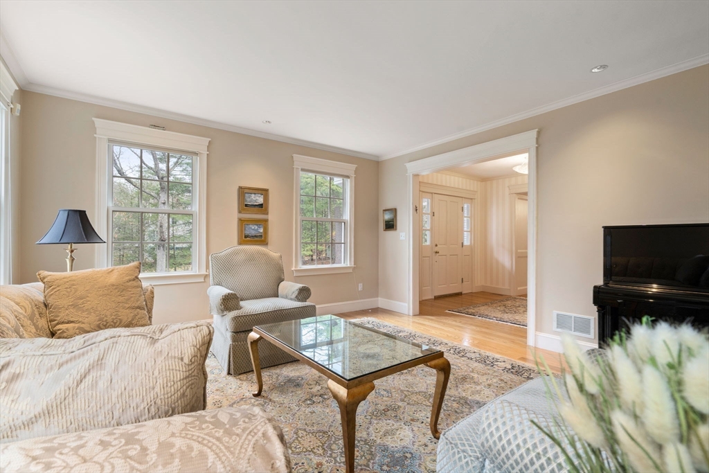5 Powisset Street Dover, MA 02030 - Photo 11 of 41 a living room with furniture and a flat screen tv