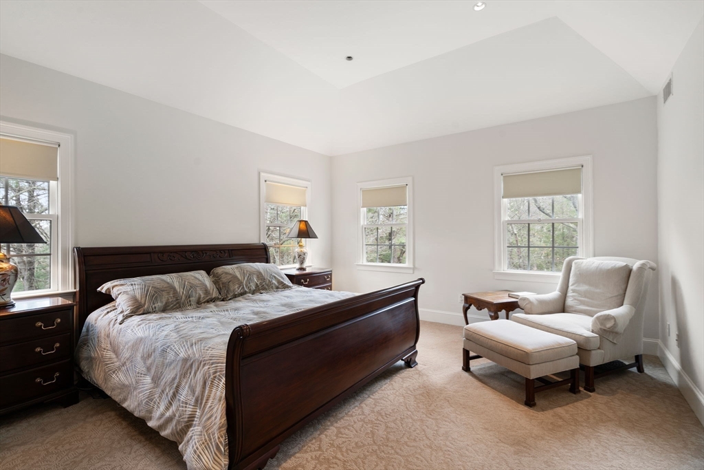 5 Powisset Street Dover, MA 02030 - Photo 21 of 41 a bedroom with a bed and a couch with window